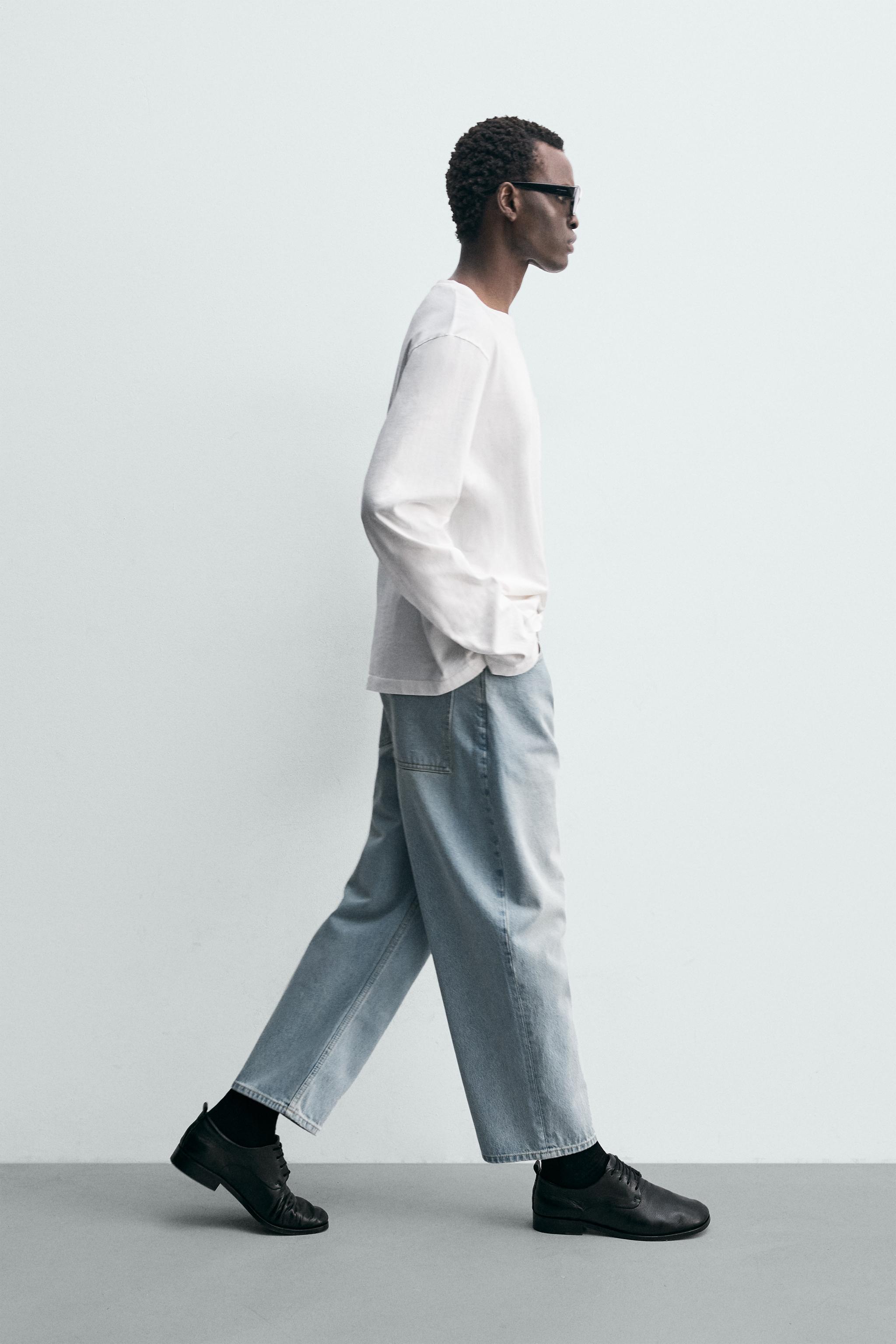 TAPERED WIDE FIT JEANS
